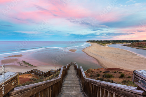 Fotografie The wooden staircase leading down to the mouth of the Onkapringa river Port Noar