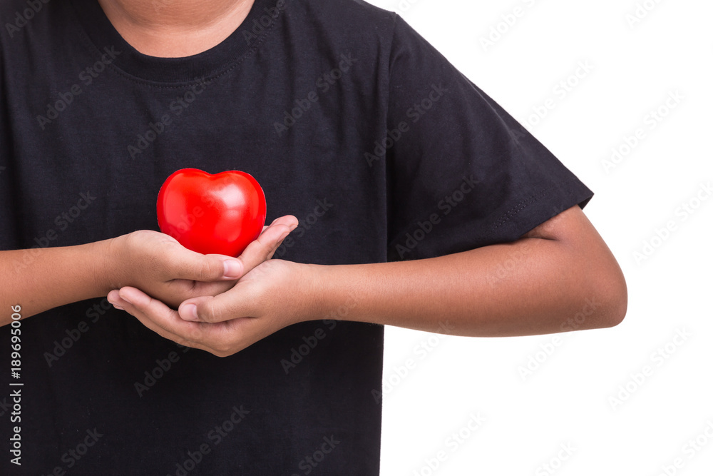 Love heart and healthcare concept : Woman holding red heart on her chest and heart position isolated on white Love heart and healthcare concept : Woman holding red heart on her chest and heart position isolated on white