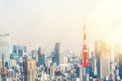 Asia Business concept for real estate and corporate construction - panoramic modern city skyline bird eye aerial view of tokyo tower under golden sun Tokyo, Japan