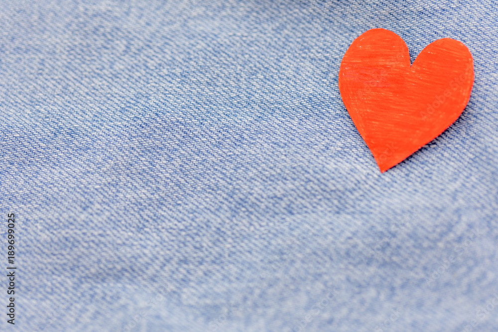 Fototapeta premium Paper red heart with Denim jeans texture background. Valentine Concept. Copy space