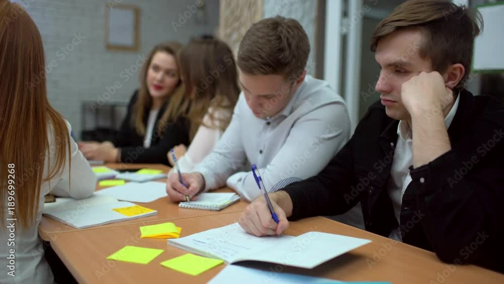 College students do group work during a lecture, 4 k College students do group work during a lecture, 4 k