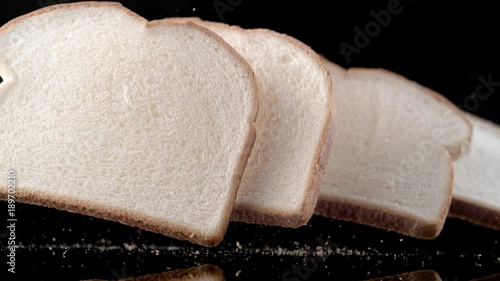 Slices of white bread falling. Shot with high speed camera, phantom flex 4K. Slow Motion.