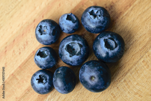 Whortleberries on wooden background