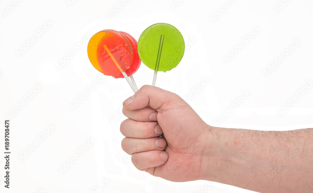 lollipops in hand isolate lollipops in hand isolate