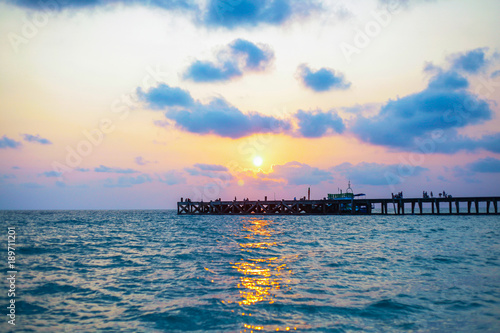 Bridge among the sunset sea © Theerapong