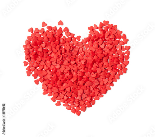Heart made of small red hearts on white