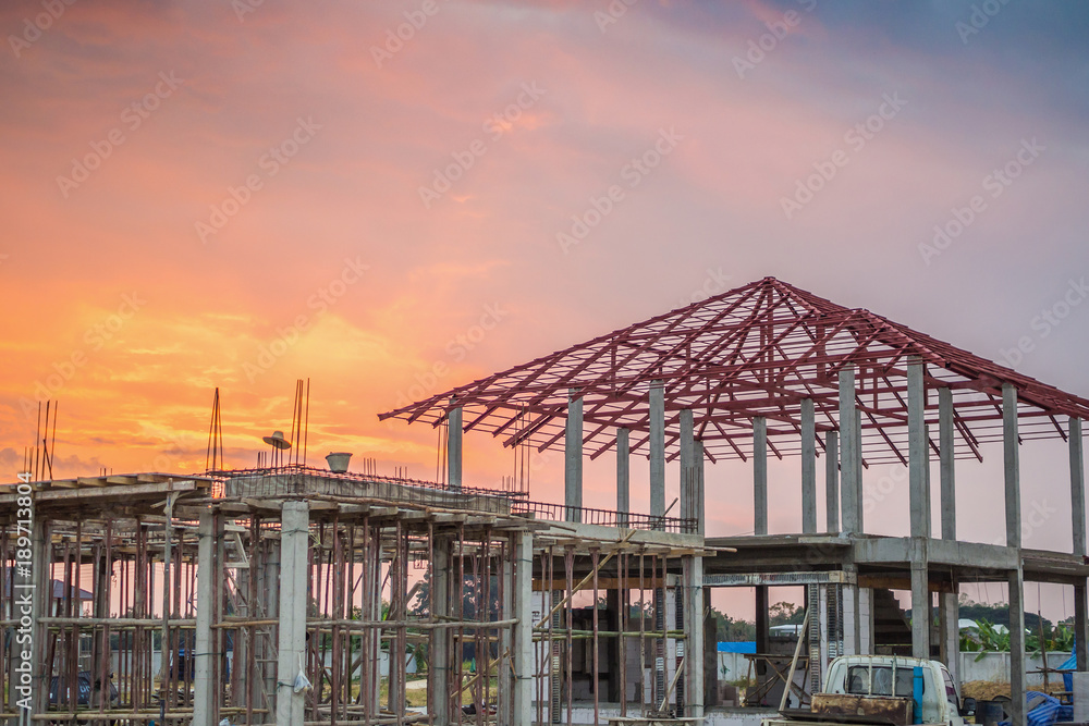 Obraz premium construction residential new house in progress at building site