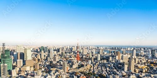 Asia Business concept for real estate and corporate construction - panoramic modern city skyline bird eye aerial view of tokyo tower and odaiba under blue sky in Roppongi Hill, Tokyo, Japan © voyata