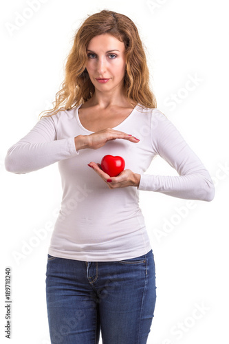 Love heart, protect and healthcare concept : Caucasian woman holding red heart on her chest and heart position isolated on white background