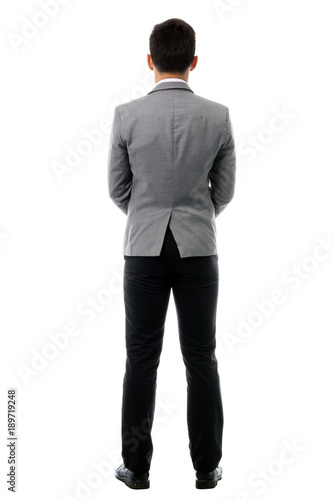 Portrait of a business man thinking from rear view. Isolated on white background with copy space