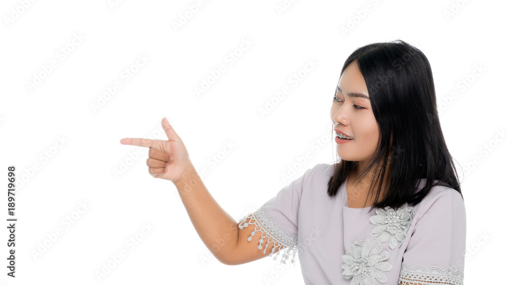Beautiful asian business woman smiling and pointed the finger to left side portrait studio on white background Beautiful asian business woman smiling and pointed the finger to left side portrait studio on white background