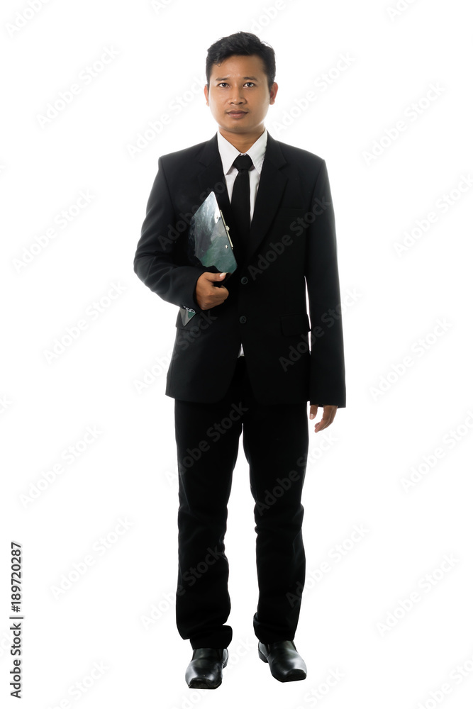 Portrait of a young business man with annual report. Isolated on white background Portrait of a young business man with annual report. Isolated on white background