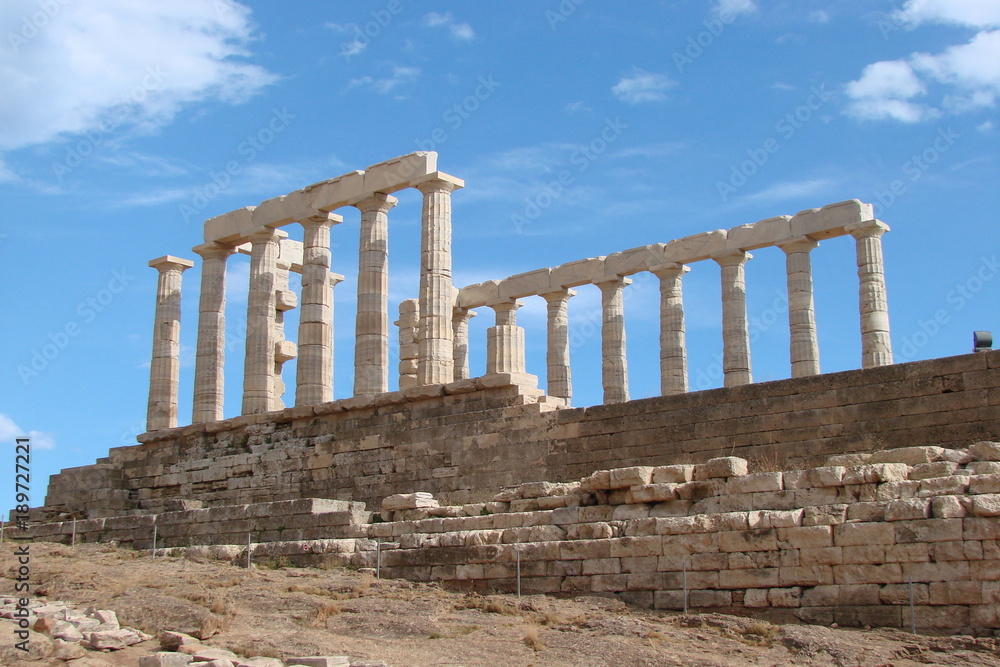 the ruins of an ancient Greek temple of the god Poseidon on the Cape Sunion.