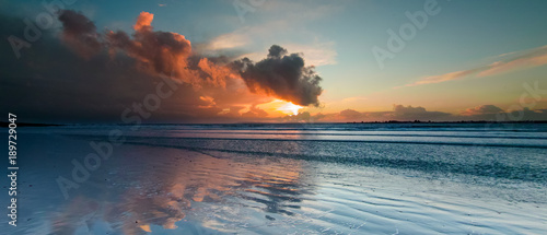 Storm Clouds at sunset over West Wittering Beach, West Sussex, UK