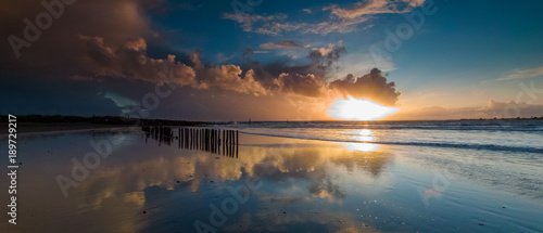 Storm Clouds at sunset over West Wittering Beach, West Sussex, UK