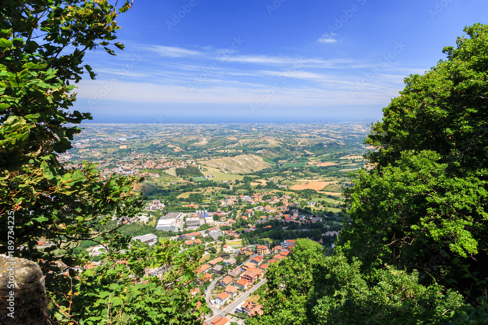 Beautiful aerial view of the village from the Mountain of San Marino. The Republic of San Marino. Beautiful aerial view of the village from the Mountain of San Marino. The Republic of San Marino.