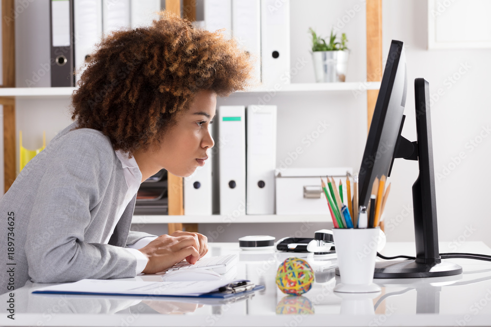Concentrating Businesswoman Working On Computer Concentrating Businesswoman Working On Computer