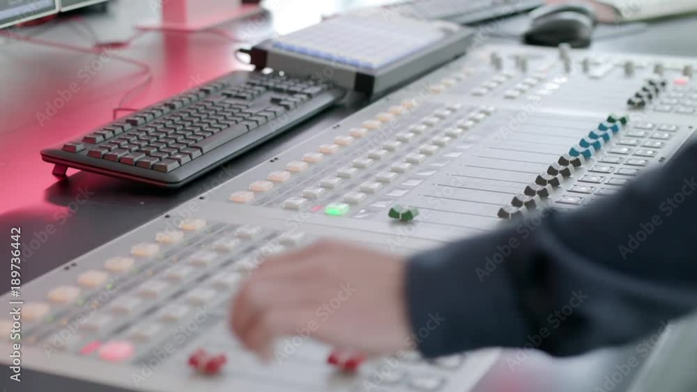 Radio DJ playing with volumes Radio DJ playing with volumes