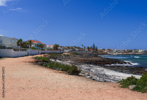 levelled pathway that leads to the beach of Corralejo, a popular resort for holidays in the Canary Islands