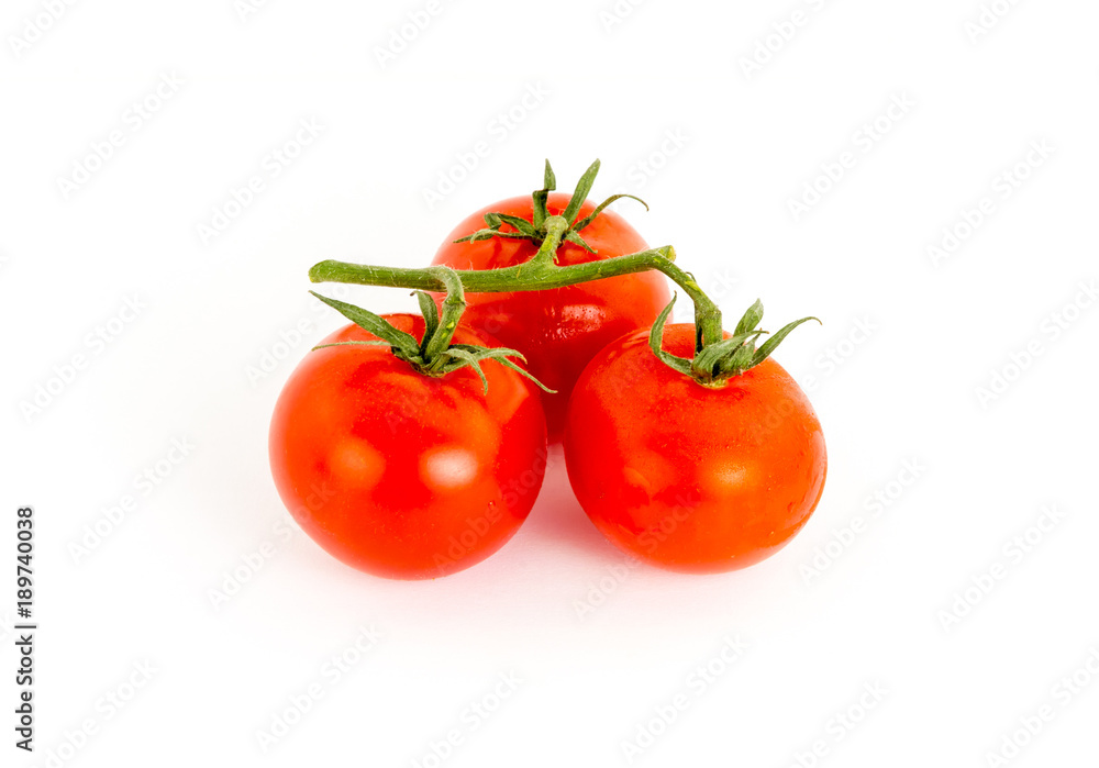 three tomato red juicy fruits branch of green on white background, vegetables one-piece symbol of healthy food ingredient salad three tomato red juicy fruits branch of green on white background, vegetables one-piece symbol of healthy food ingredient salad