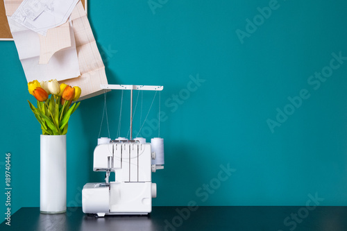The serger on table in workshop. photo