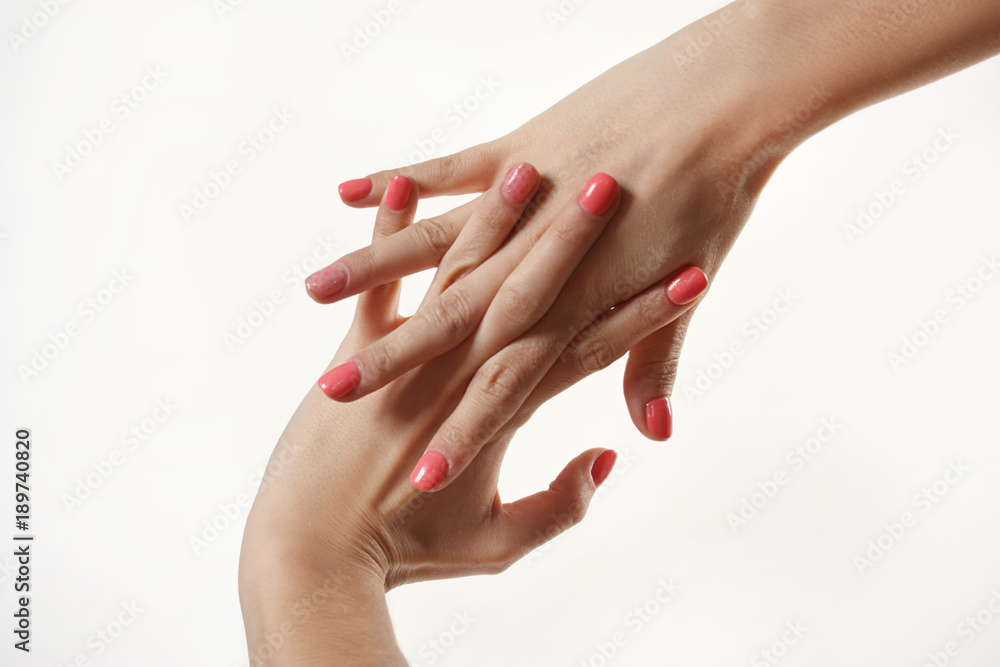 Fototapeta premium gestures with female hands. female hands manicure on white background