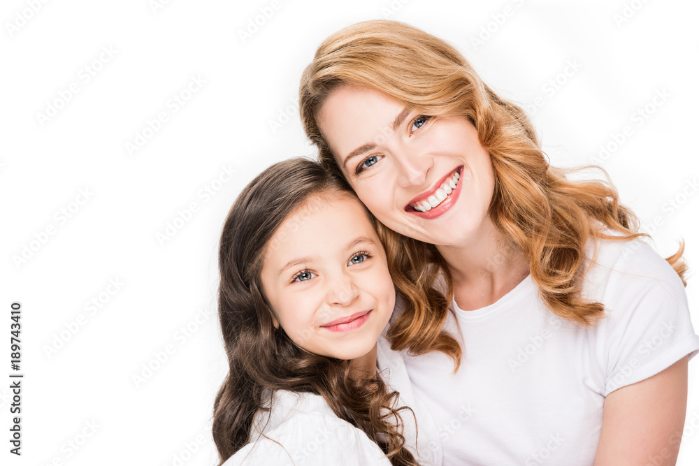 portrait of happy mother and daughter looking at camera isolated on white portrait of happy mother and daughter looking at camera isolated on white