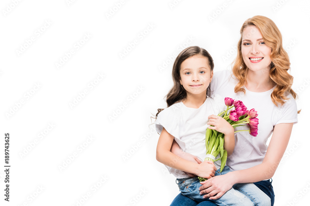 happy mother and little daughter with bouquet of flowers isolated on white, mothers day holiday concept happy mother and little daughter with bouquet of flowers isolated on white, mothers day holiday concept