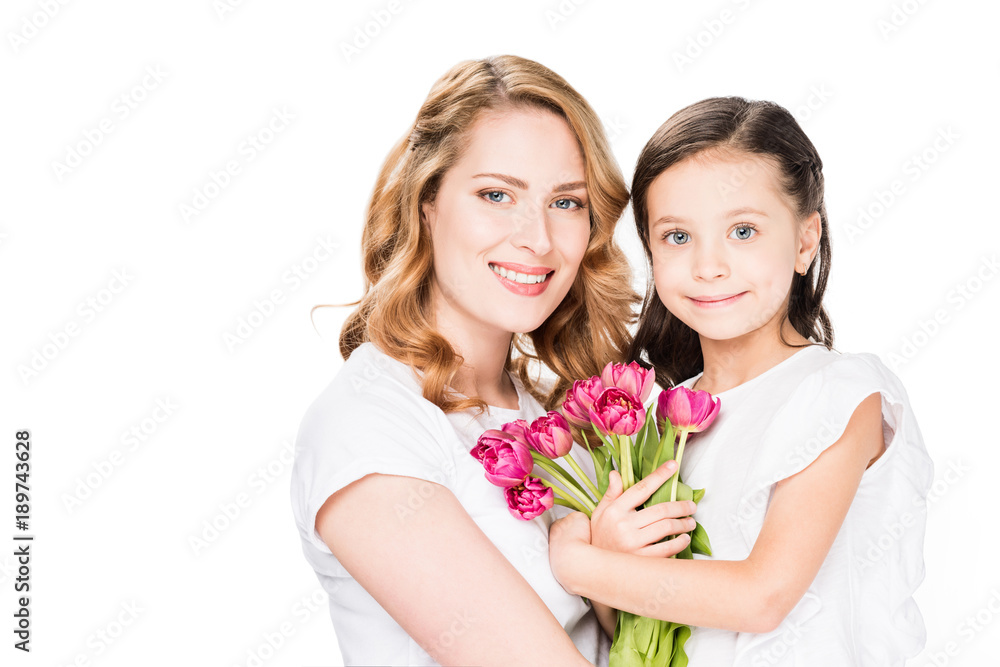 portrait of happy mother and little daughter with bouquet of flowers isolated on white, mothers day holiday concept portrait of happy mother and little daughter with bouquet of flowers isolated on white, mothers day holiday concept
