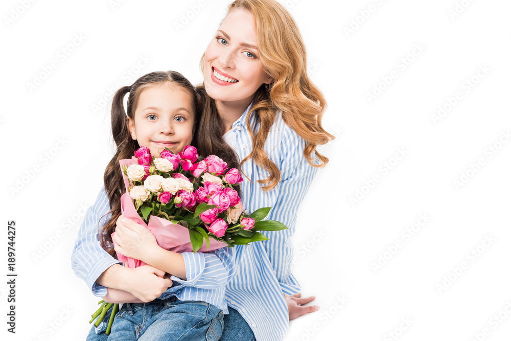 cheerful mother and little daughter with bouquet of flowers isolated on white, mothers day concept cheerful mother and little daughter with bouquet of flowers isolated on white, mothers day concept