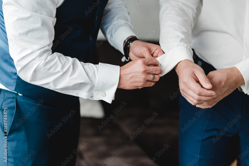 Obraz premium getting ready groom bride wedding