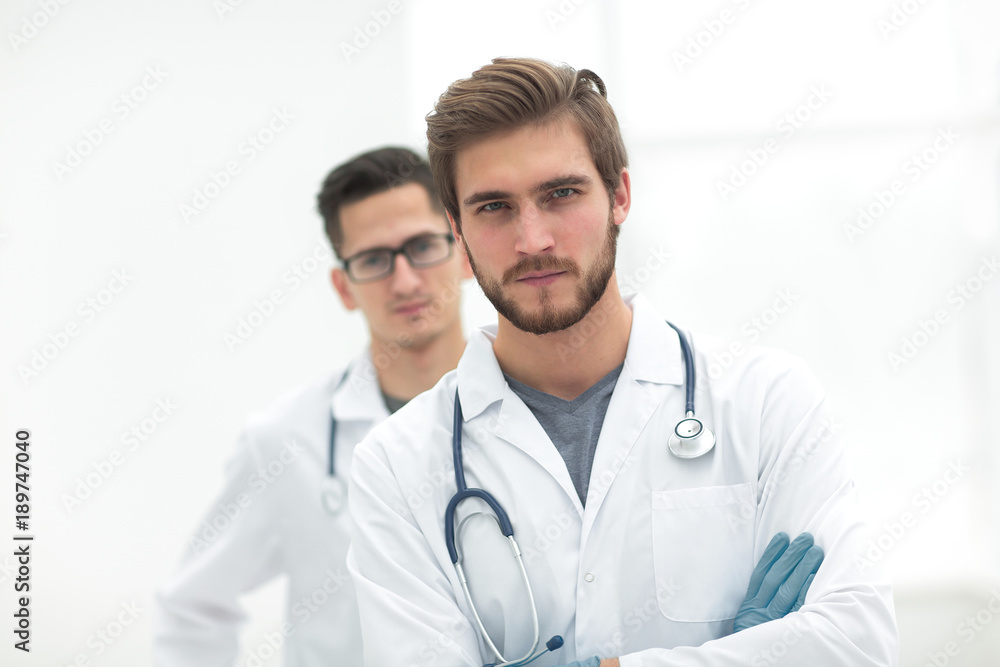 closeup. confident doctor in the background of a colleague closeup. confident doctor in the background of a colleague