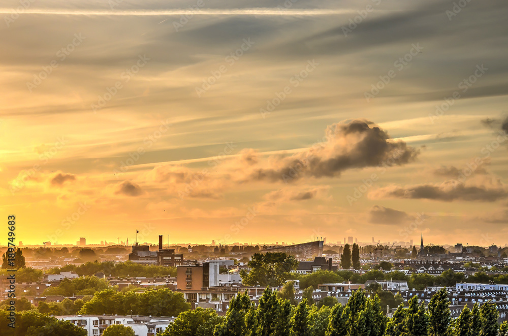 Spectacular sky at sunset above the neighbourhoods of Crooswijk and the Old North in Rotterdam, The Netherlands