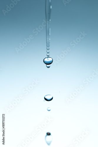 Dripping water drops.