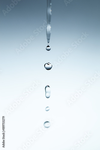 Dripping water drops.
