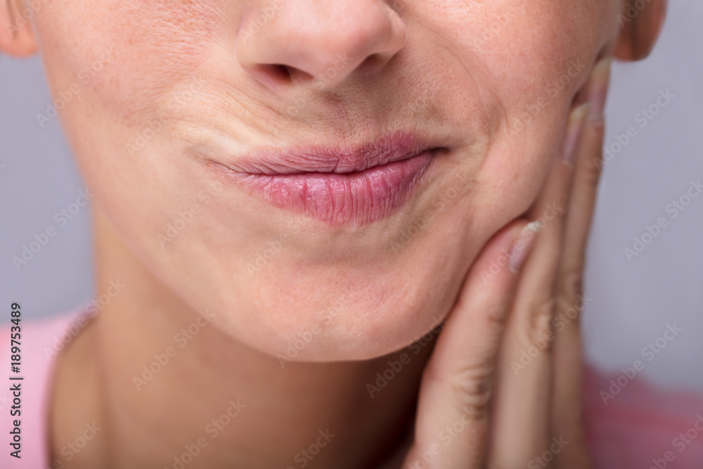 Young Woman Suffering From Toothache Young Woman Suffering From Toothache