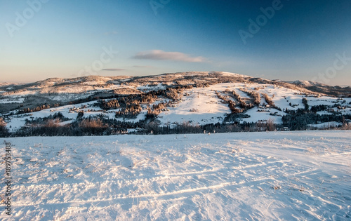 view from Ochodzita hill in winter Silesian Beskids mountains in Poland during winter morning