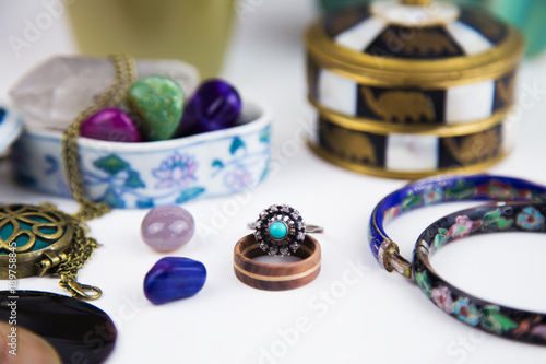 Mixed kinds of jewelry with gemstones and vintage jewelry boxes