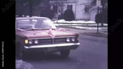 1960s cars dressed up for a wedding photo