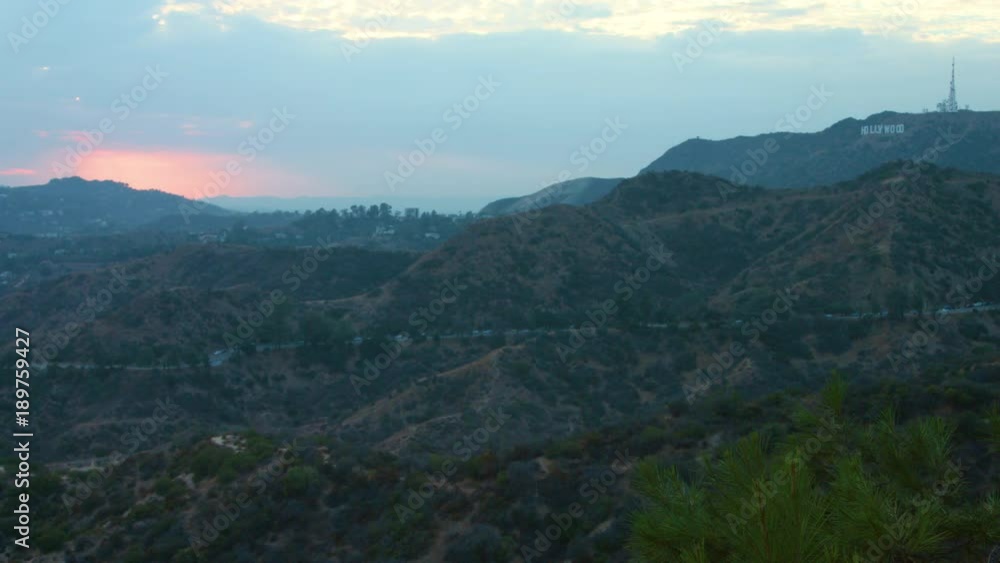 Hollywood sign wide in Hollywood hills hazy day smog, fires, cloudy, sunset Hollywood sign wide in Hollywood hills hazy day smog, fires, cloudy, sunset