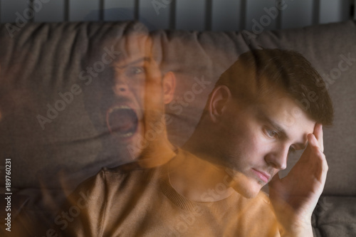 Angry And Stressed Man At Home photo