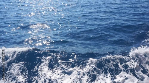 Wallpaper Mural Ship wake on the ocean. Water foam trace behind the large ship goes till the horizon. 4K Torontodigital.ca