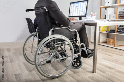 Businessman Sitting In Wheelchair © Andrey Popov