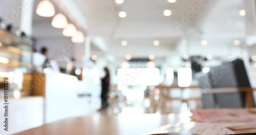 people in modern cafe restaurant, abstract blur scene