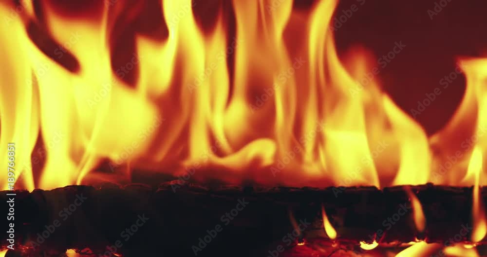 closeup fire flames in fireplace slow motion closeup fire flames in fireplace slow motion