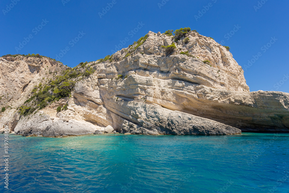 Blue sea and rocks on sunny day on Greek Island Zakynthos