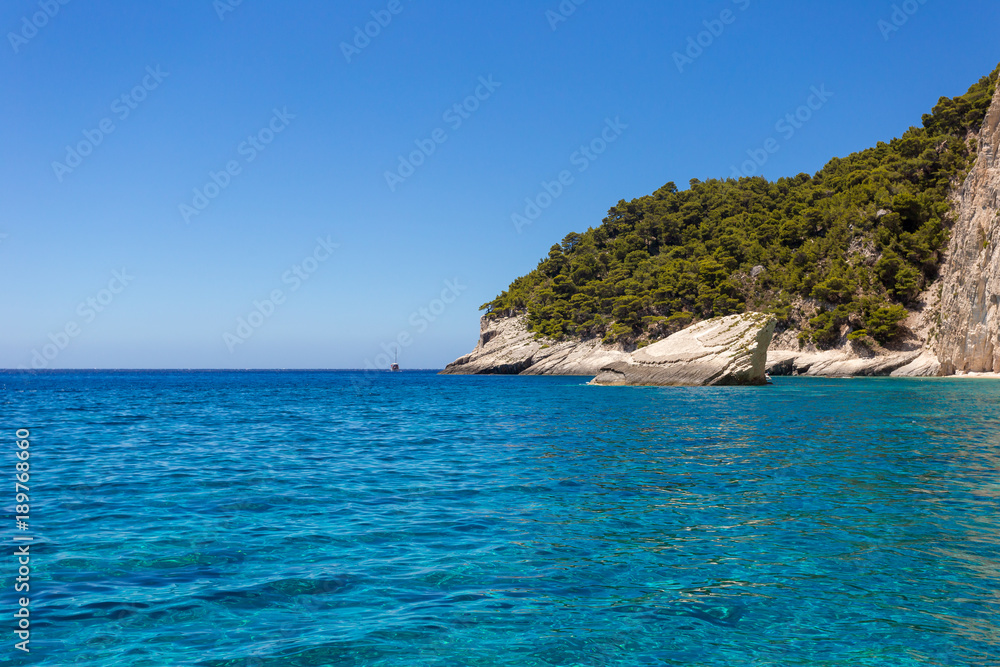 Blue sea and rocks on sunny day on Greek Island Zakynthos