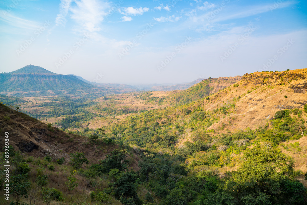 Hills mountains valleys canyons, misty landscape in Madhya Pradesh, India Hills mountains valleys canyons, misty landscape in Madhya Pradesh, India