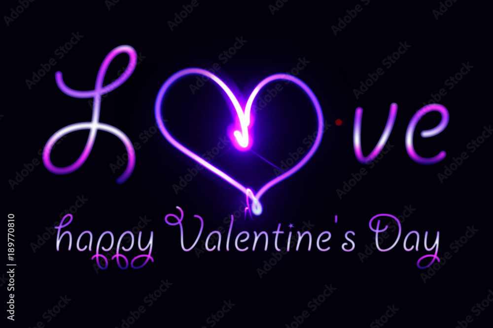 Neon  inscription of a happy Valentine's Day on a dark background