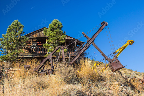 Abandoned Retro Crane Buckets In Desert